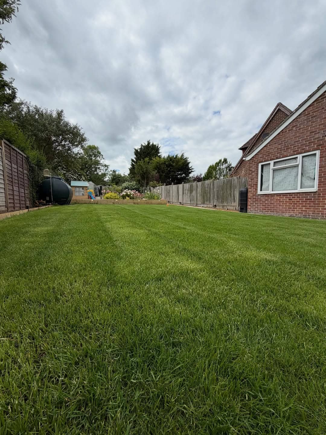 Garden Makeover With Porcelain Patio & Turf after photo 10